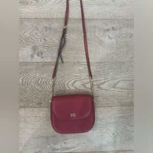 Michael Kors red pebble leather cross body - adjustable strap - like new